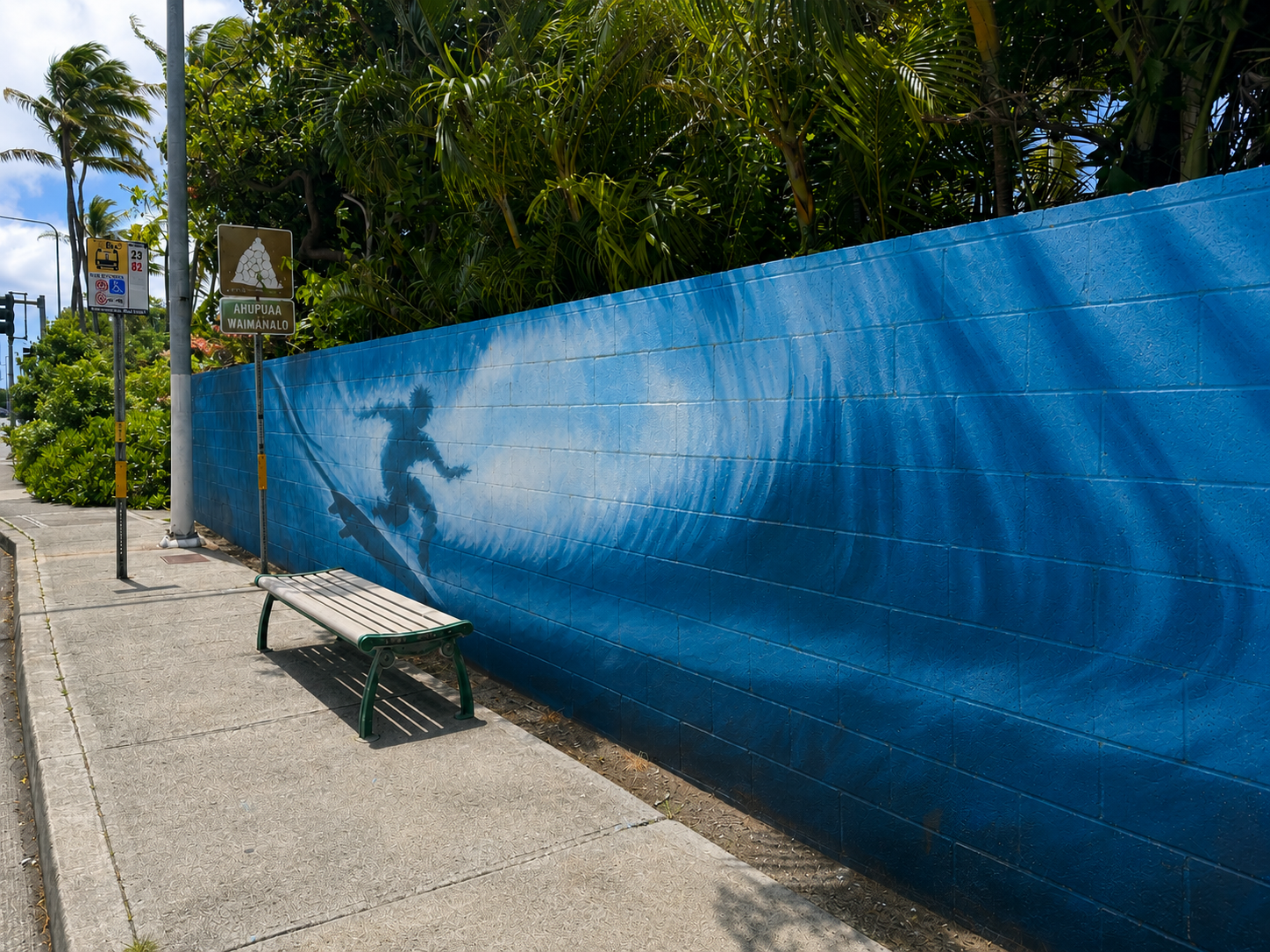 Wave and surfer wall mural by Noa Hardisty